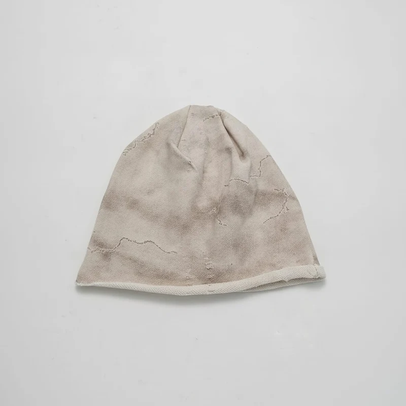 Cuffia melange con strappi a stella - Bianco sporco