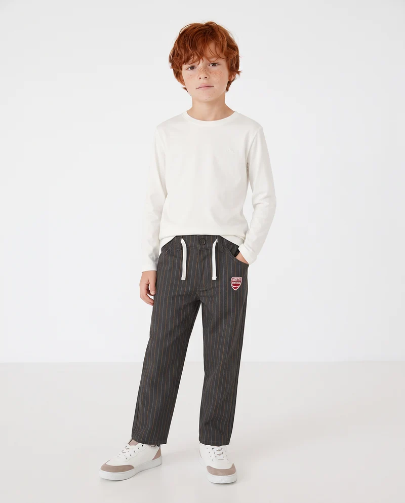 Pantaloni a righe con toppa e cintura - Righe