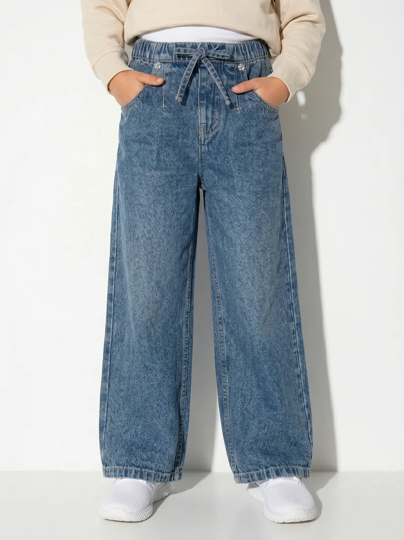 Pantaloni jogger denim wide leg con tasche - Denim