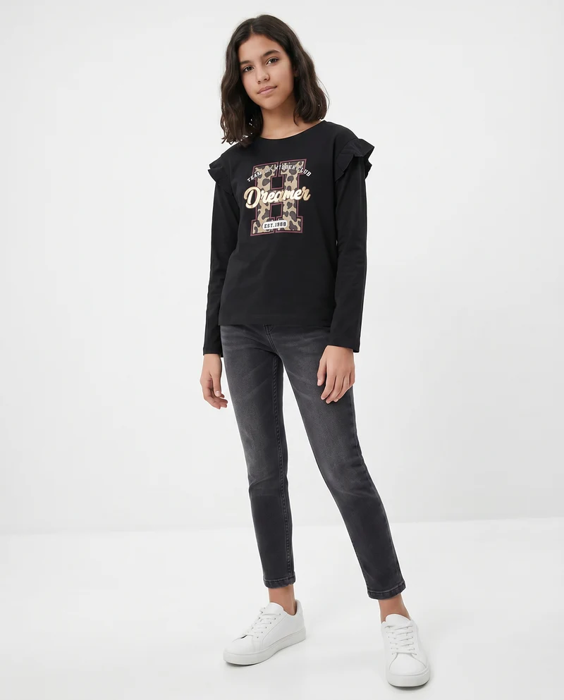 T-shirt lunga con rouches e stampa vivace - Nero