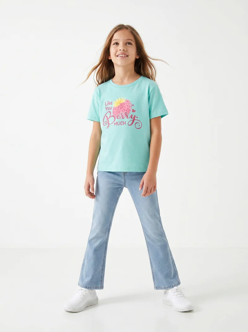 T-shirt bambina con stampa e spacchetti - Verde acqua