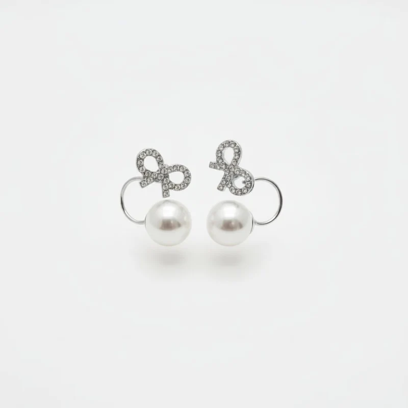 Orecchini perla con fiocco di strass - Argento