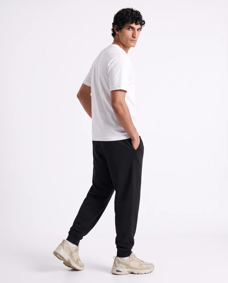 Pantaloni Jogger Interlock con Tasche - Nero