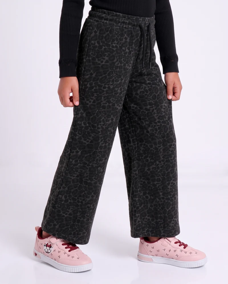 Jogger gamba larga con stampa trendy - Nero