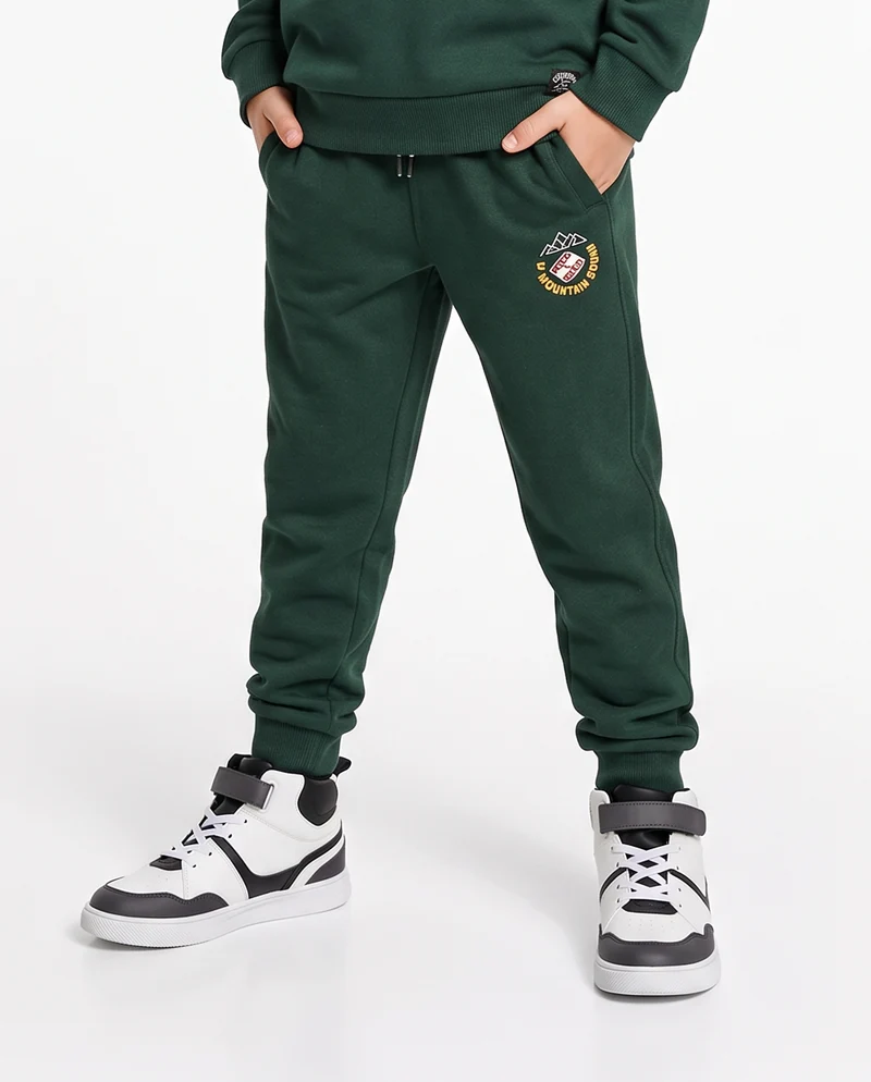 Jogger in felpa con stampa e tasche - Verde abete