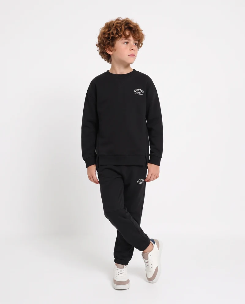 Felpa girocollo minimal con stampa e spacchetti - Nero