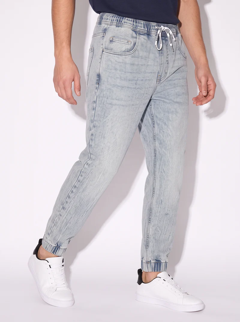 Jeans jogger con vita elasticizzata - Denim chiaro