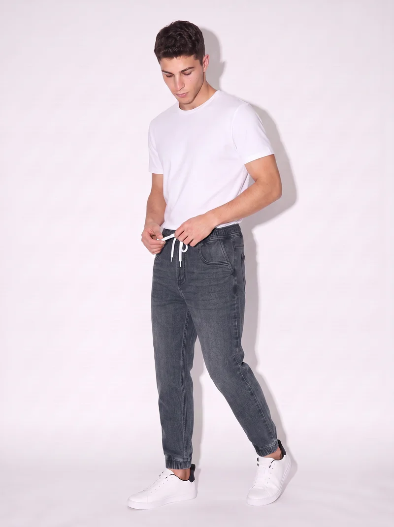 Jeans jogger con vita elasticizzata - Denim