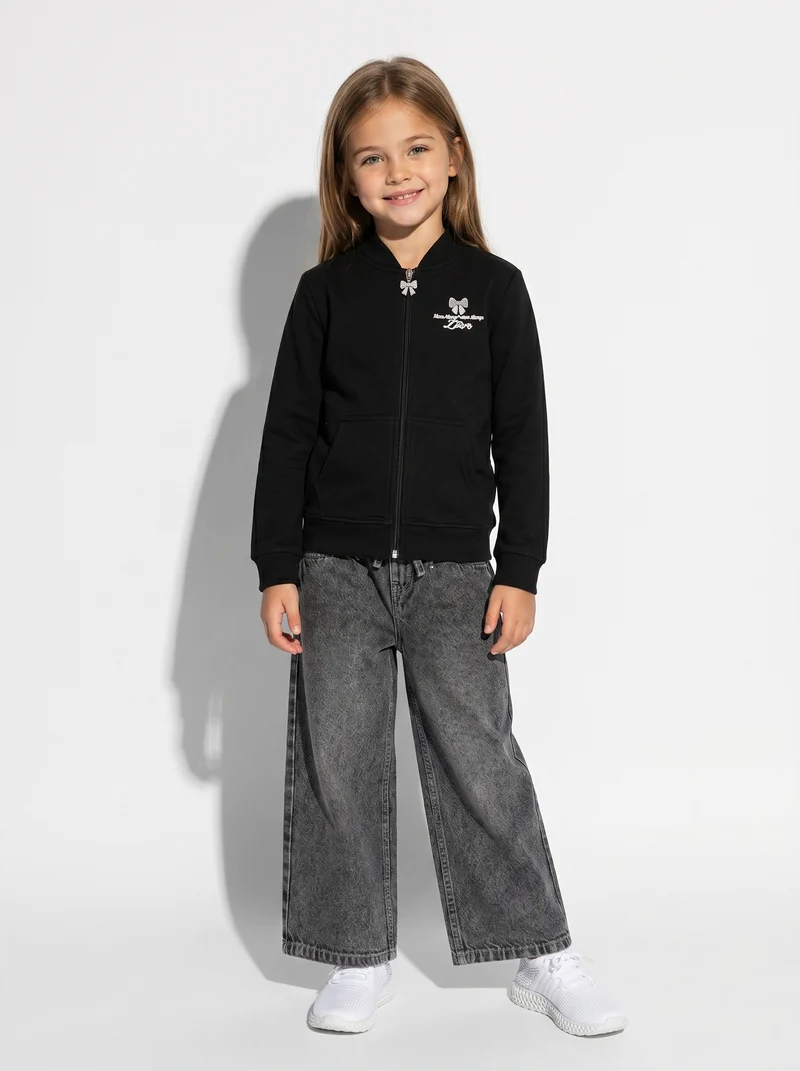 Pantaloni jogger denim wide leg con tasche - Nero