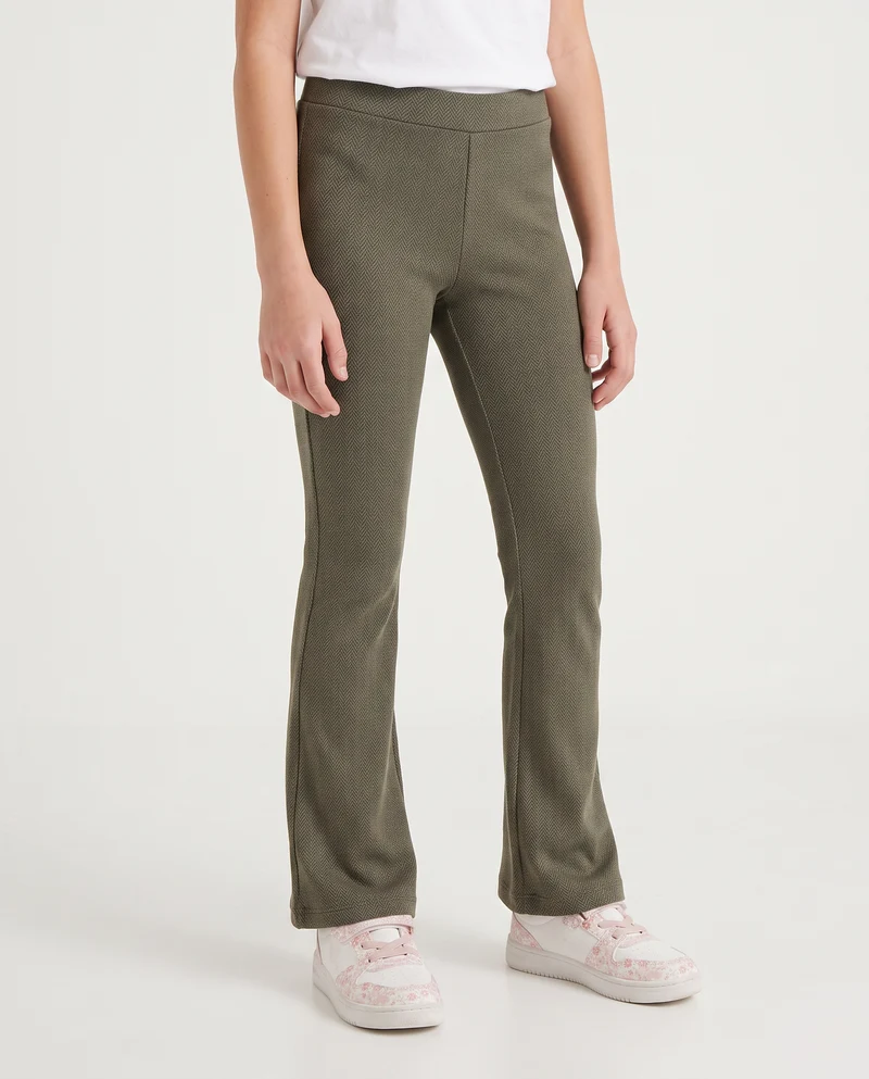 Pantaloni flare in tessuto spigato elastico - Verde