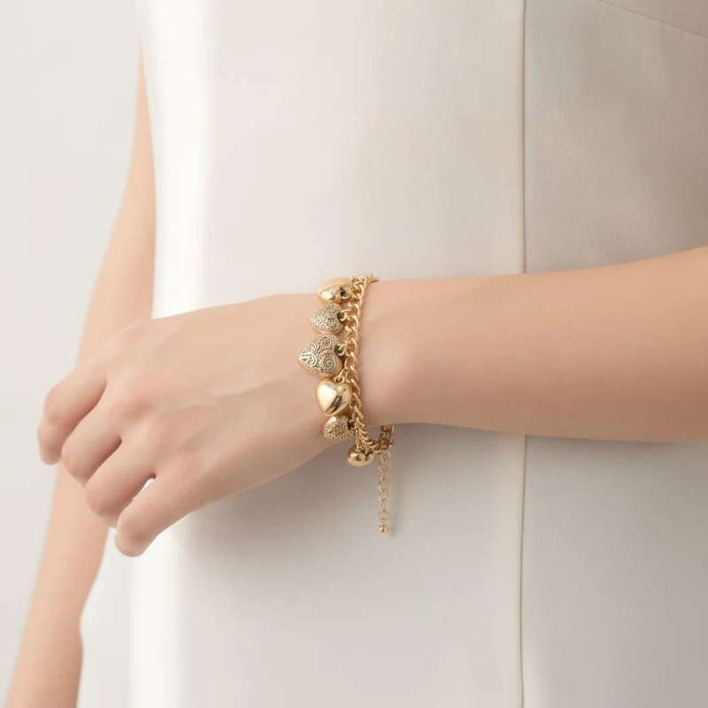 Bracciale di cuori lisci e intarsiati - Oro