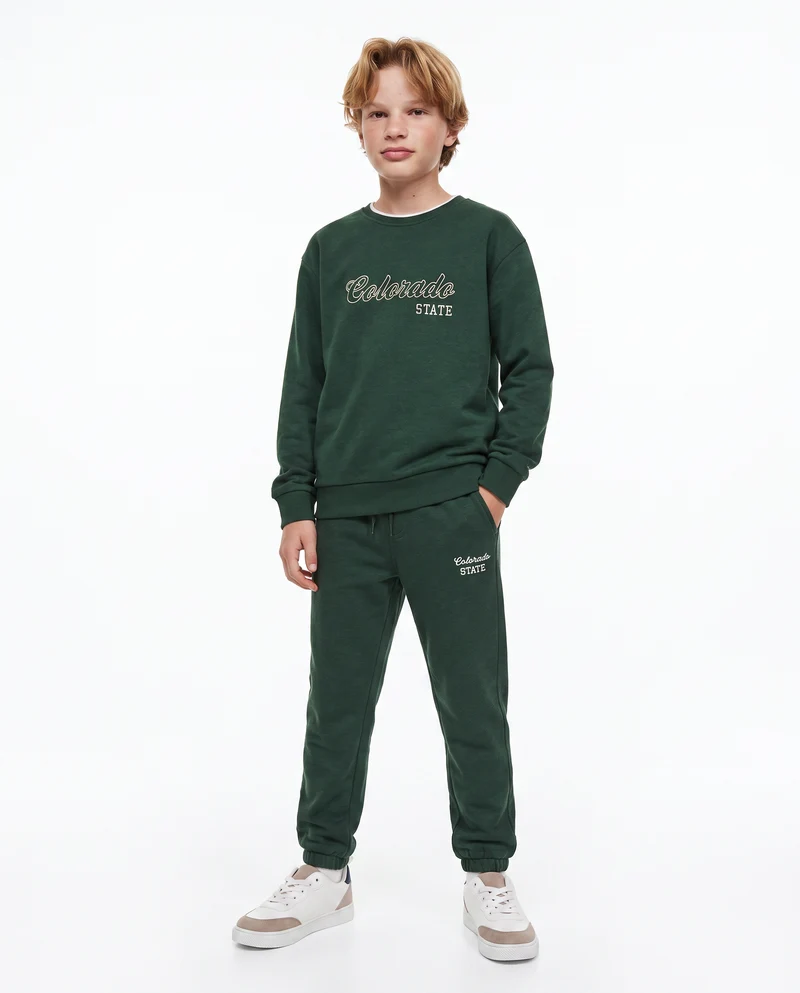 Jogger college con ricamo e tasche - Verde abete