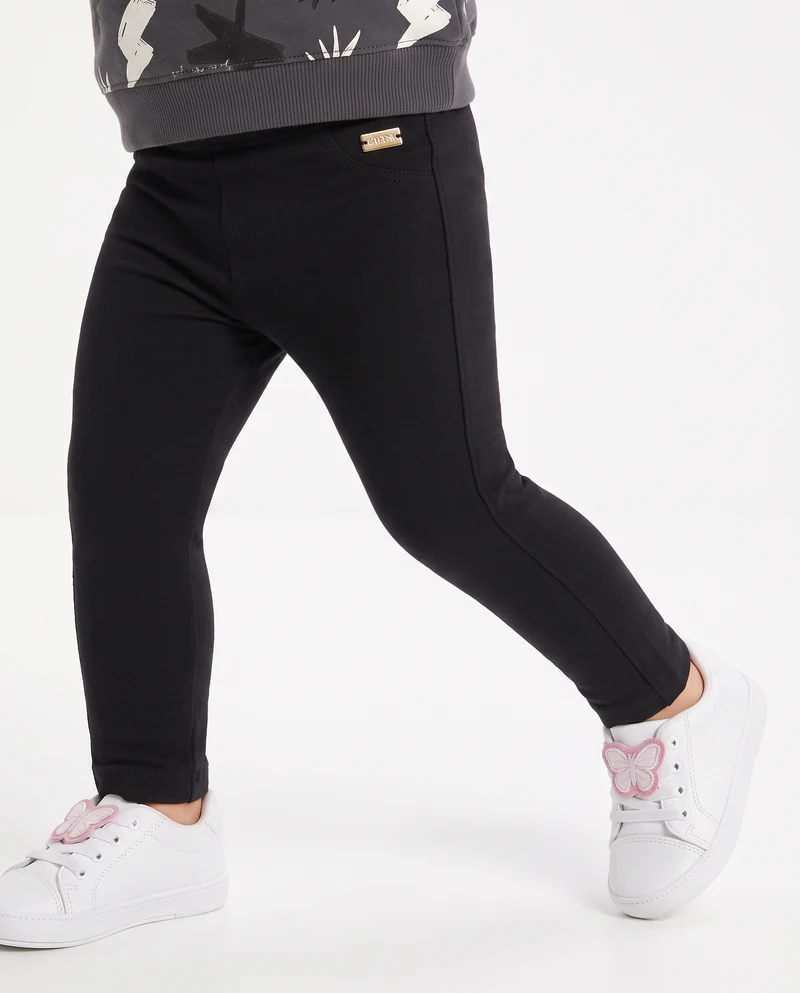 Leggings in felpa elastica con tasche - Nero