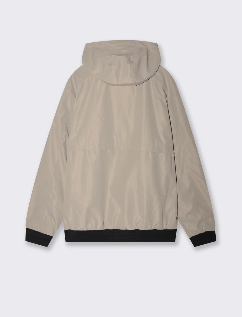 Giubbotto antivento con cappuccio regolabile - Beige