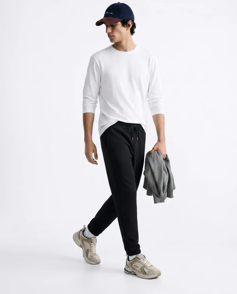 Pantaloni in felpa con vita jogger - Nero