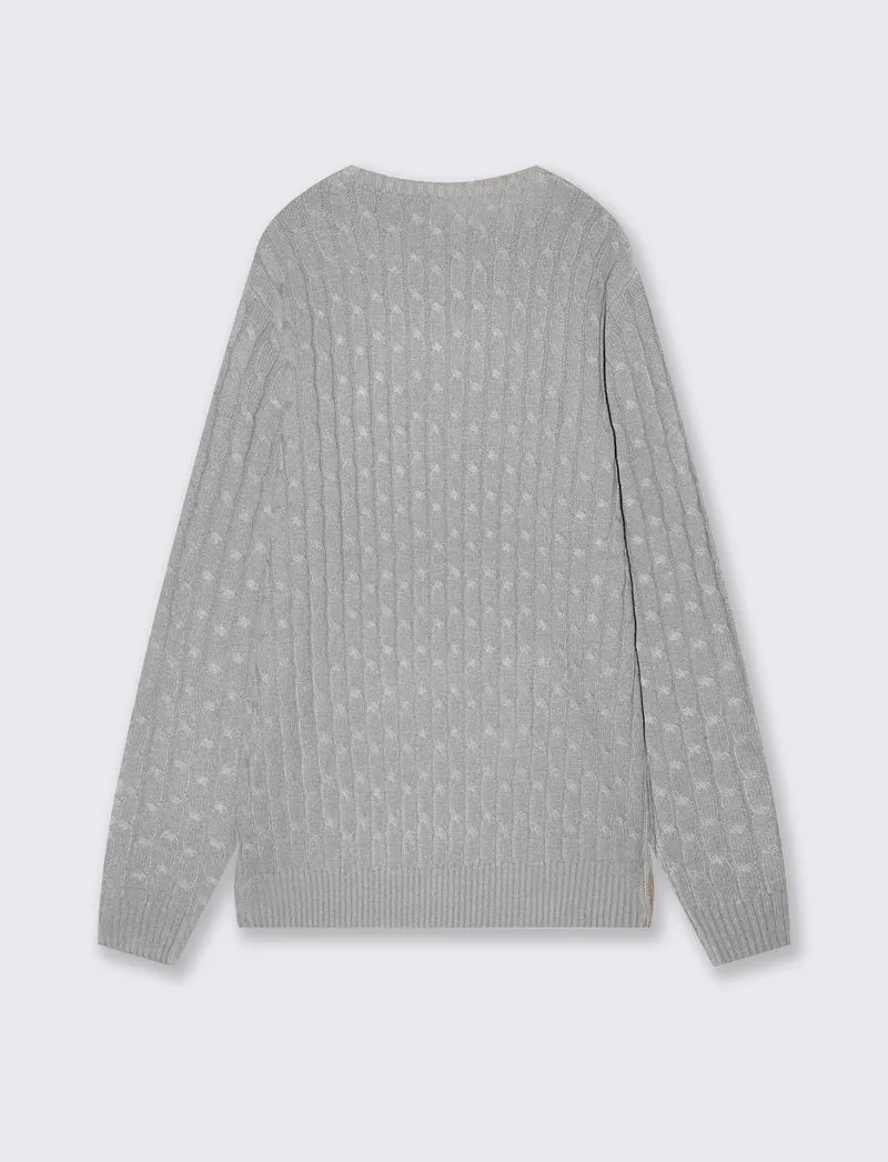 Maglia girocollo a trecce con ricamo - Grigio mel.