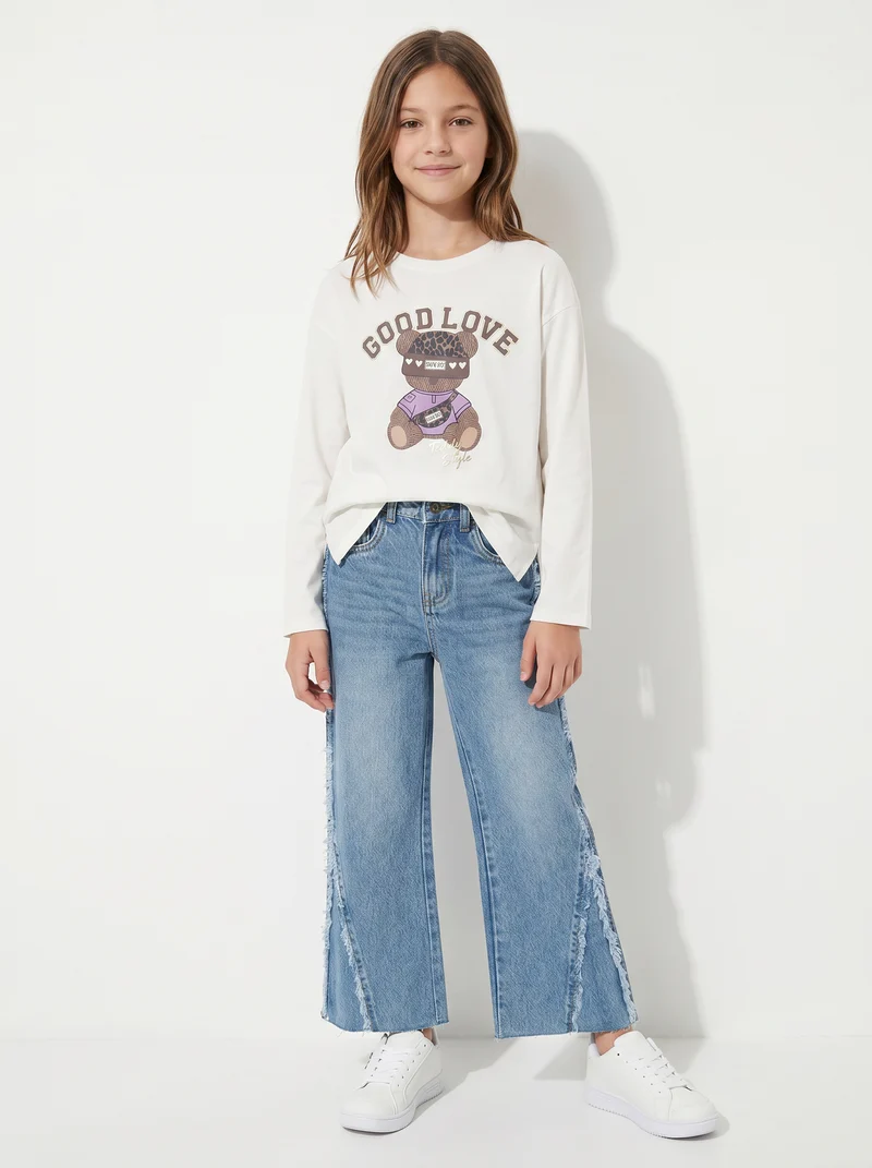 Jeans flare fit con frange laterali - Denim