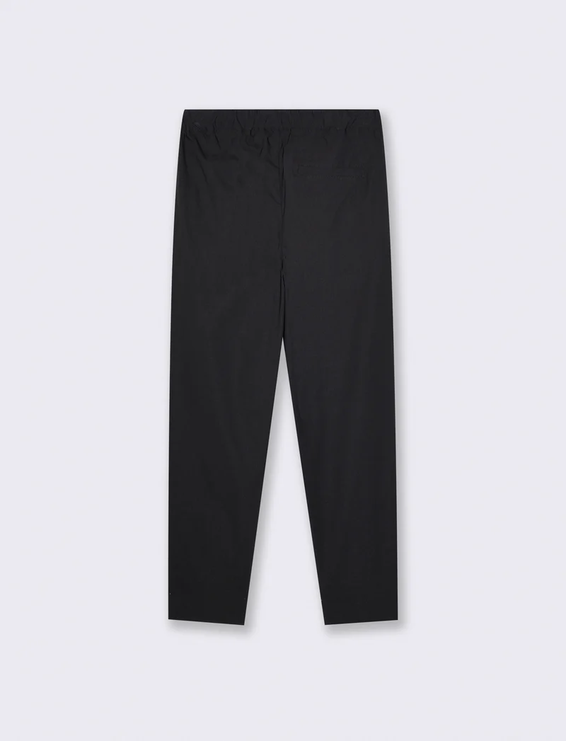 Pantaloni chino jogger uomo in tessuto tecnico - Nero