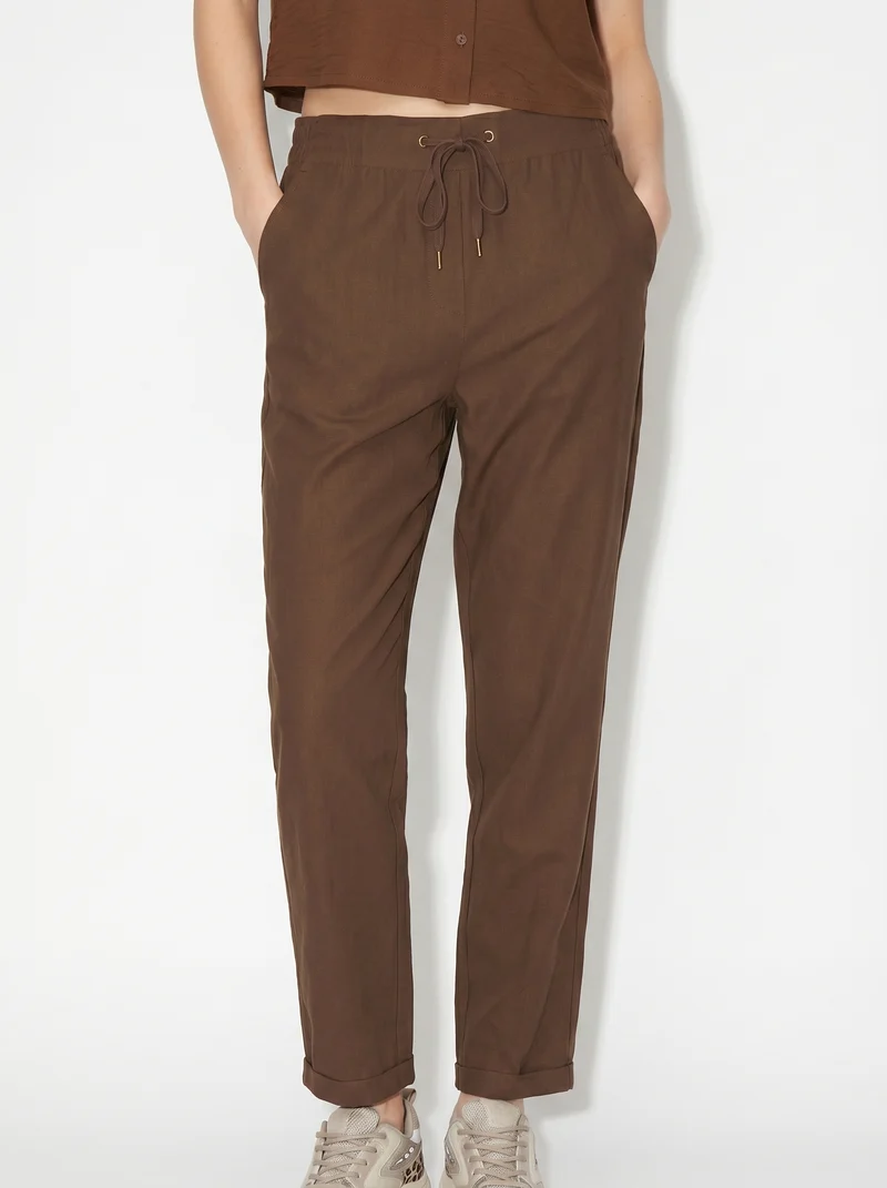 Pantalone con elastico e coulisse in vita - Marrone cioccolato