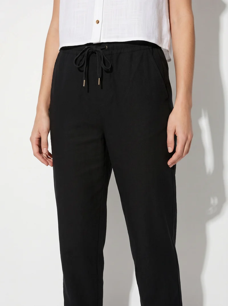 Pantalone con elastico e coulisse in vita - Nero