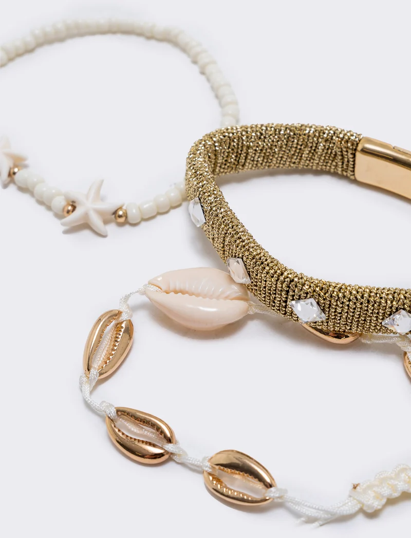Bracciali conchiglie e stelle marine - Oro