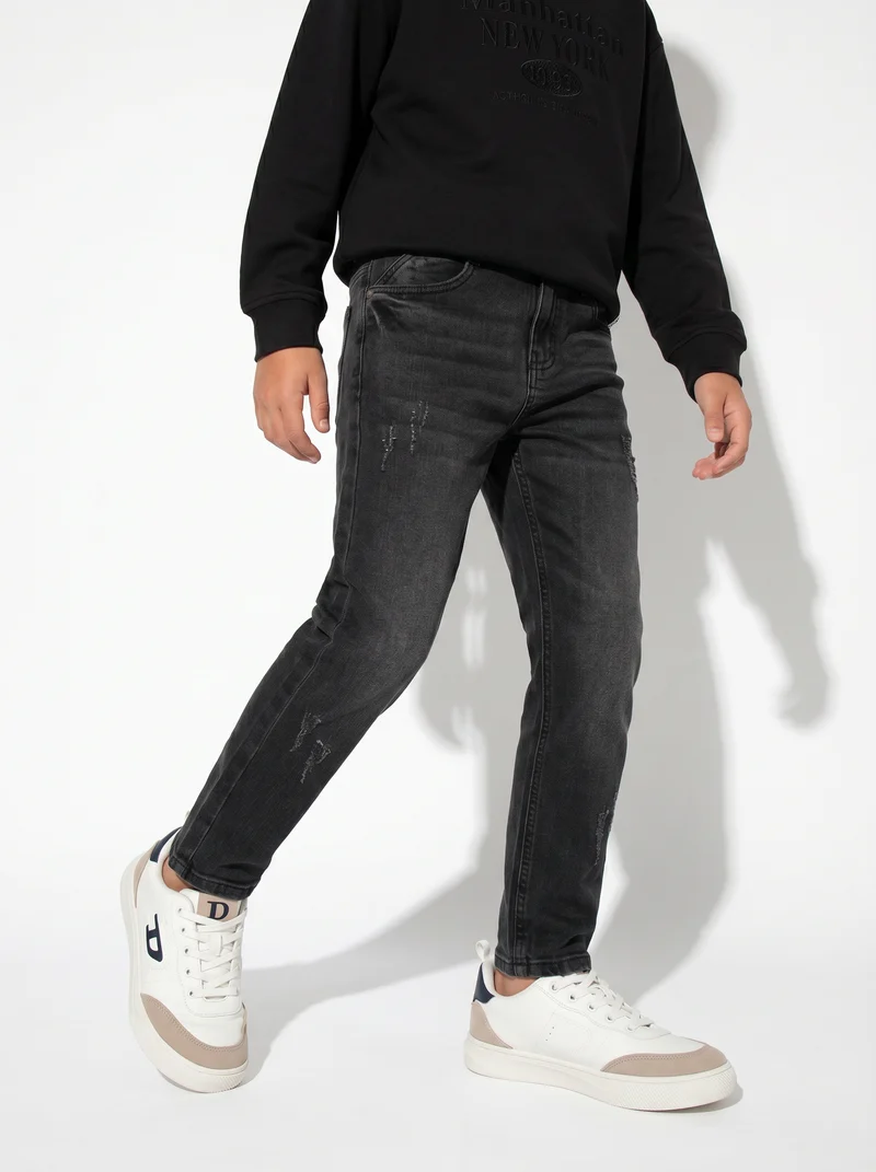 Jogging denim skinny con stile college - Nero