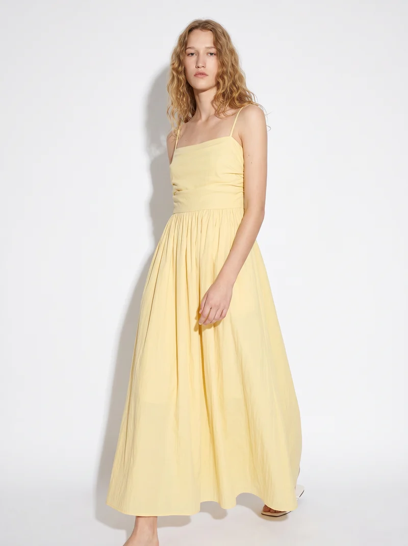 Vestito lungo con corpetto a costine e tasche - Giallo pastello