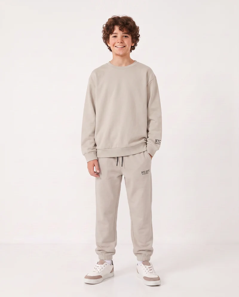 Jogger in felpa con coulisse e patch - Beige