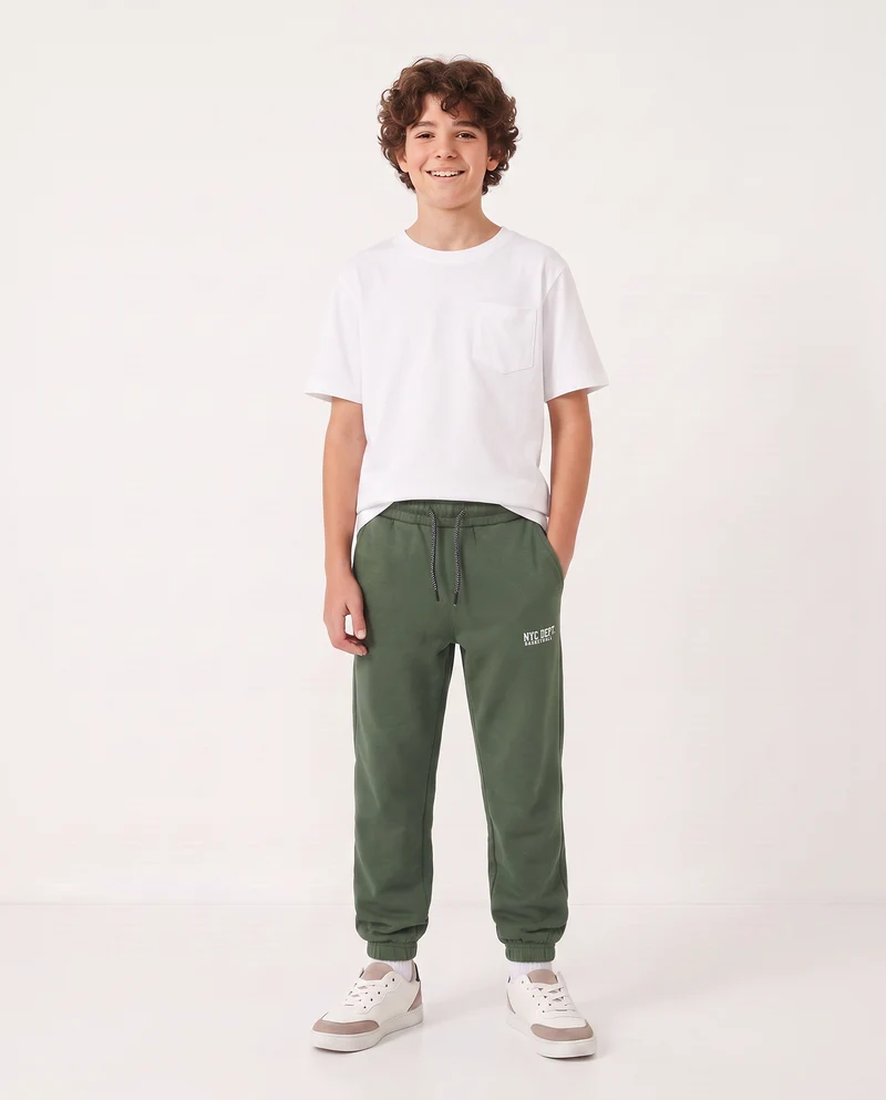Jogger in felpa con coulisse e patch - Verde abete