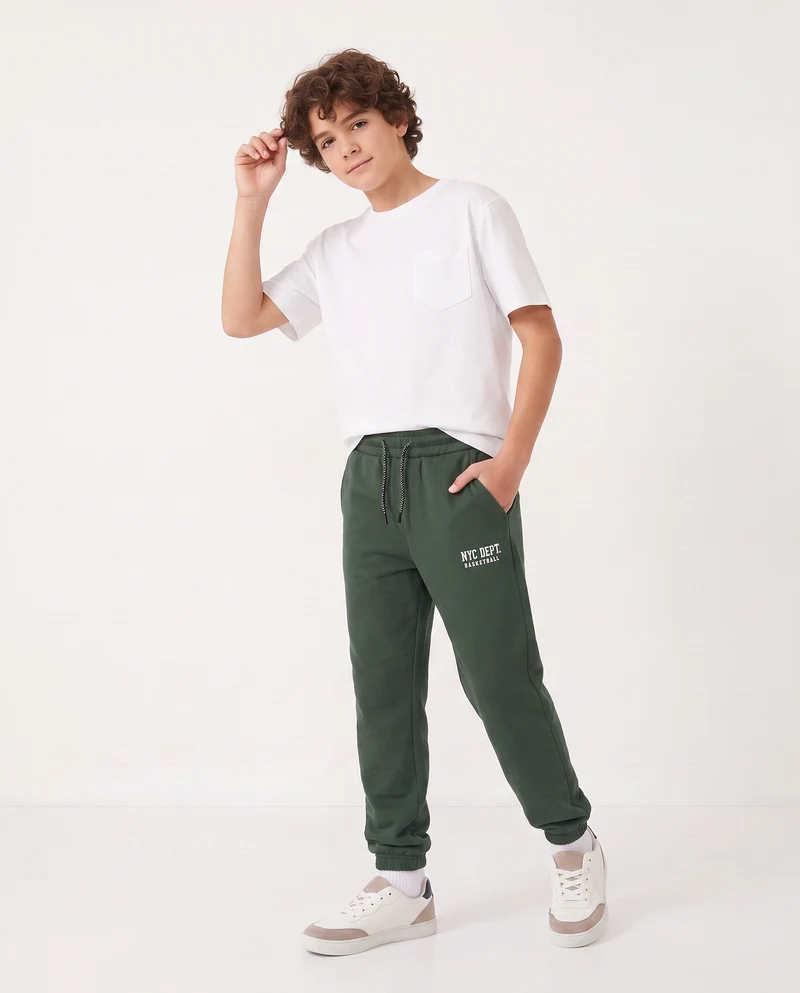 Jogger in felpa con coulisse e patch - Verde abete