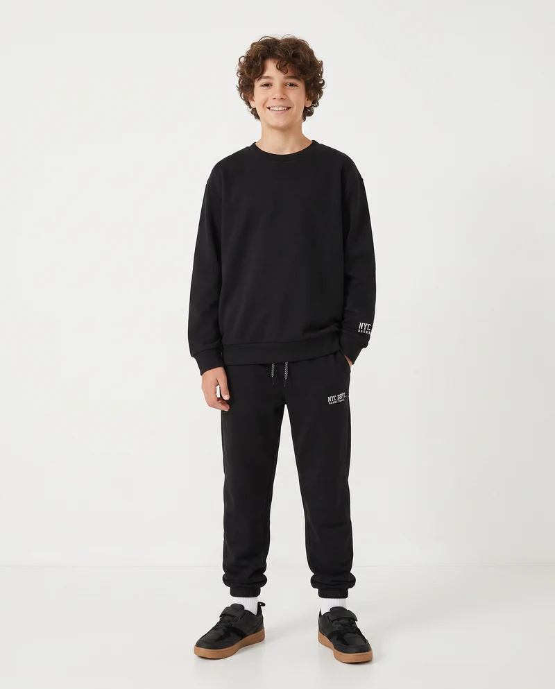 Jogger in felpa con coulisse e patch - Nero