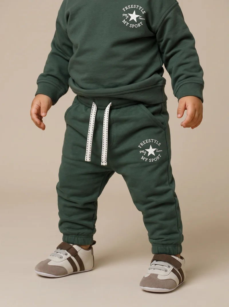 Jogger basico in cotone con stampa - Verde abete