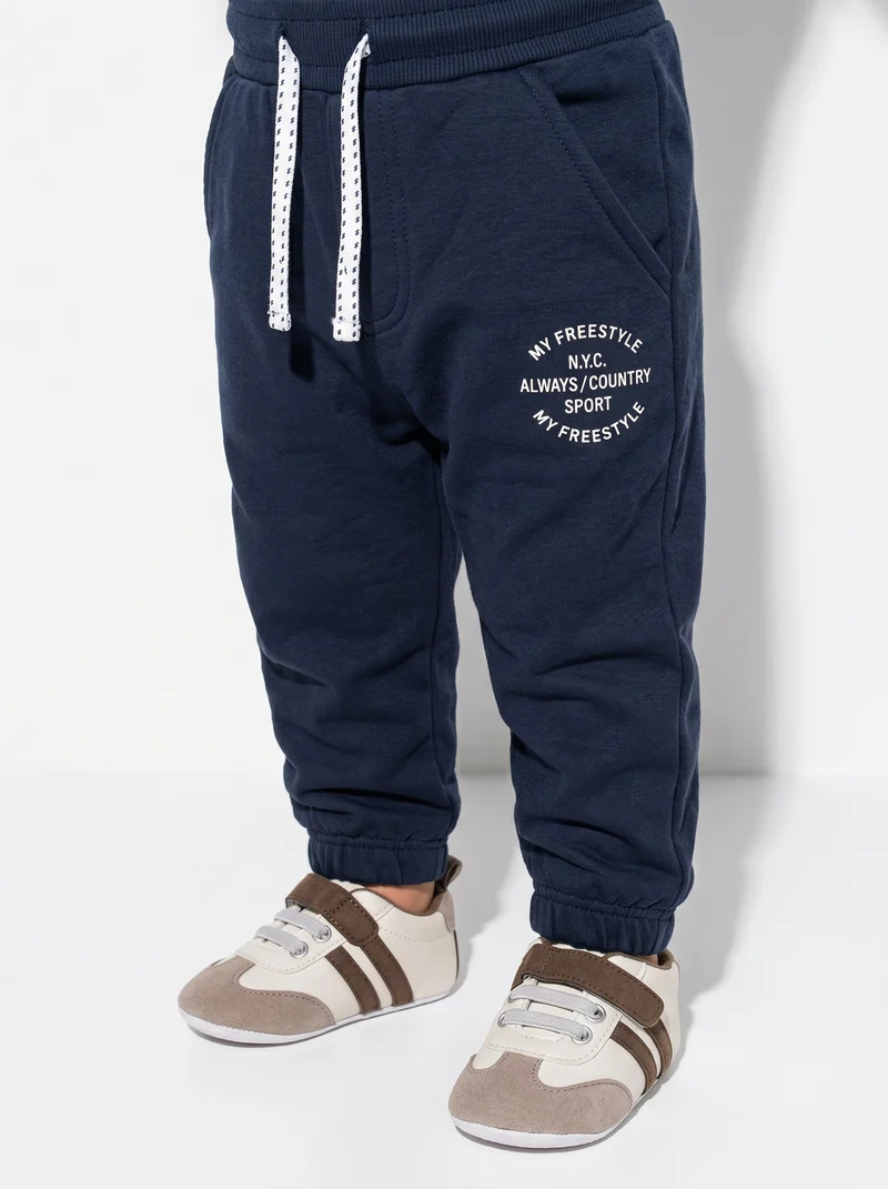 Jogger basico in cotone con stampa - Blu
