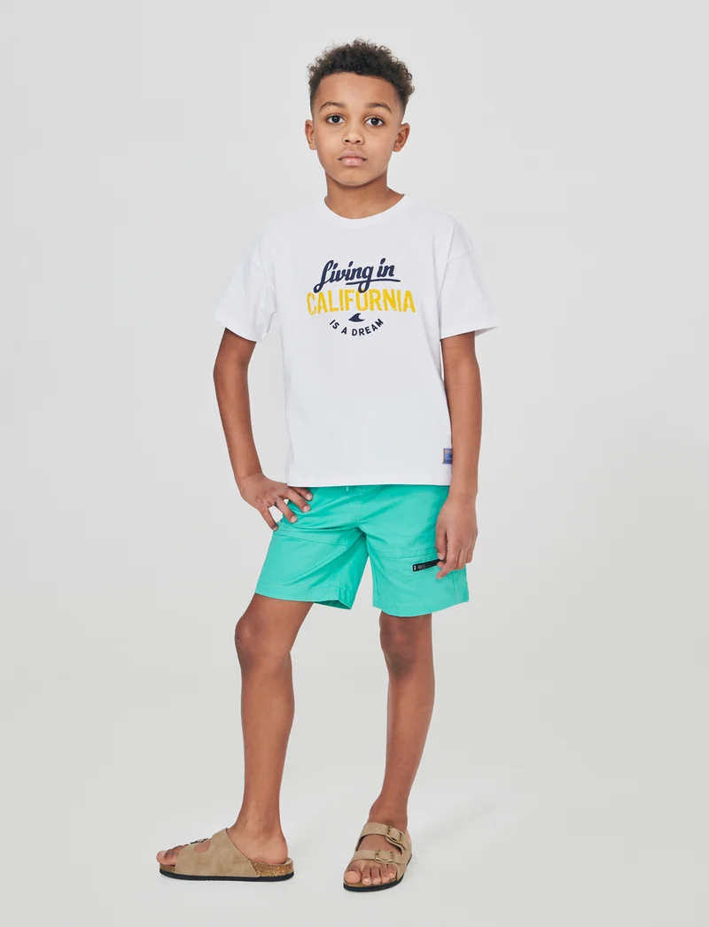 Bermuda in cotone con stampe e tasche - Verde acqua