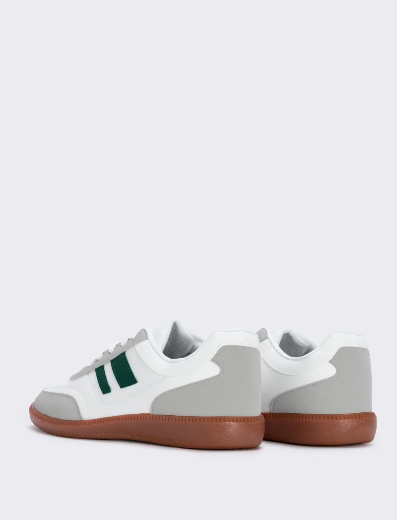 Sneakers bianche con inserti verdi da uomo - Bianco