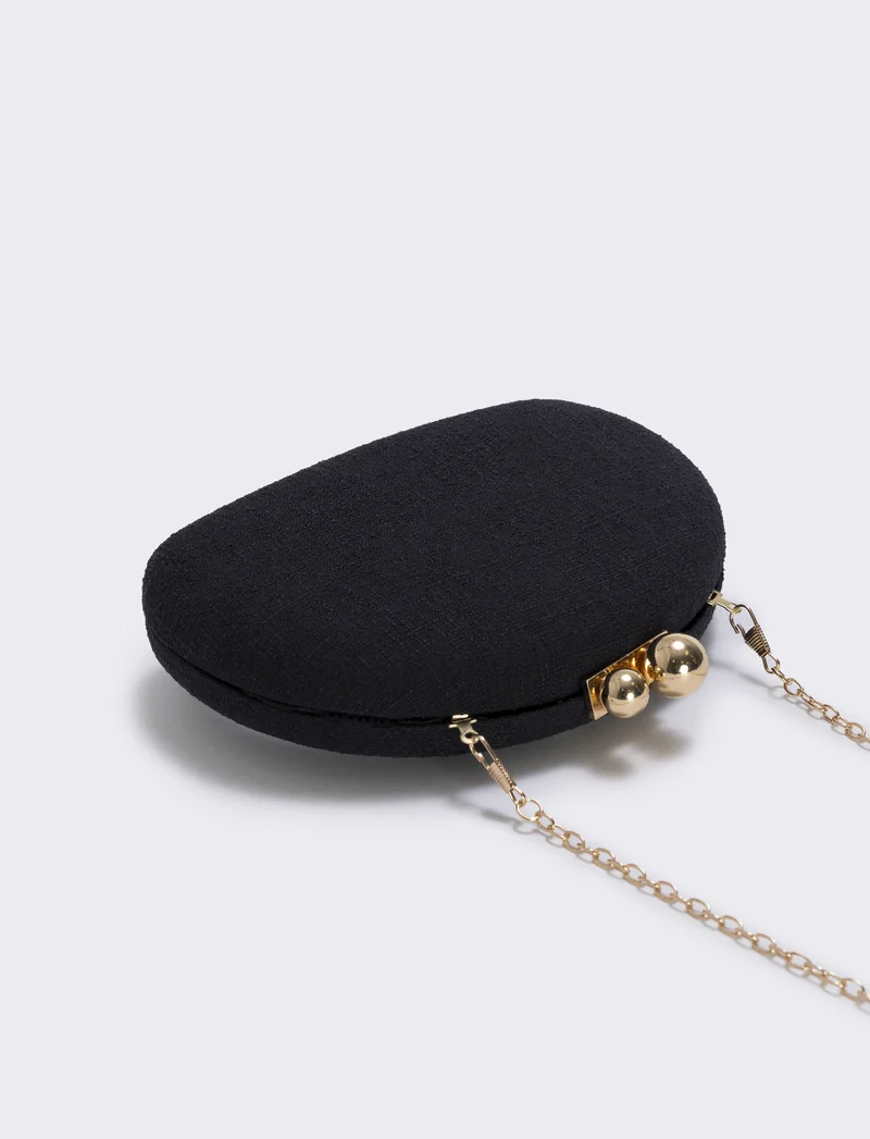 Borsetta clutch rigida mezzaluna in tessuto - Nero