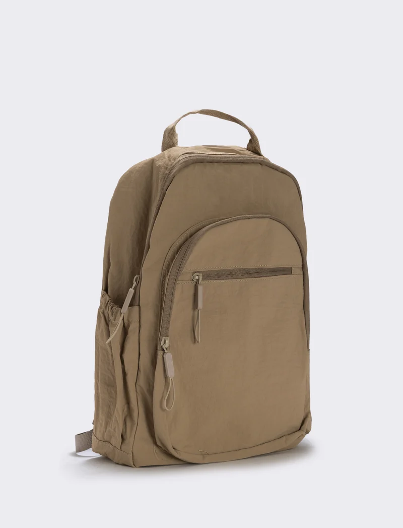 Zainetto in nylon con tasca frontale - Beige