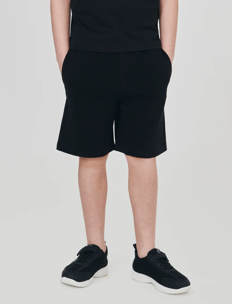 Bermuda in felpa dal look casual e stiloso - Nero