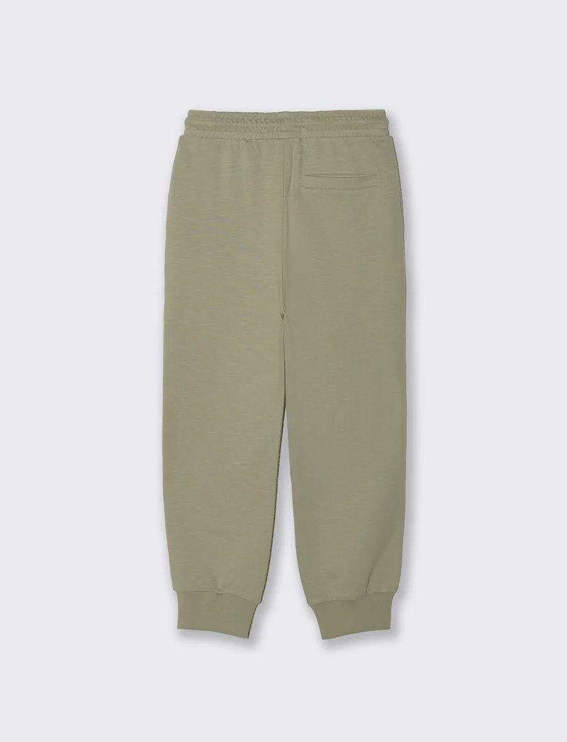 Jogger in felpa fiammata con tagli laterali - Verde