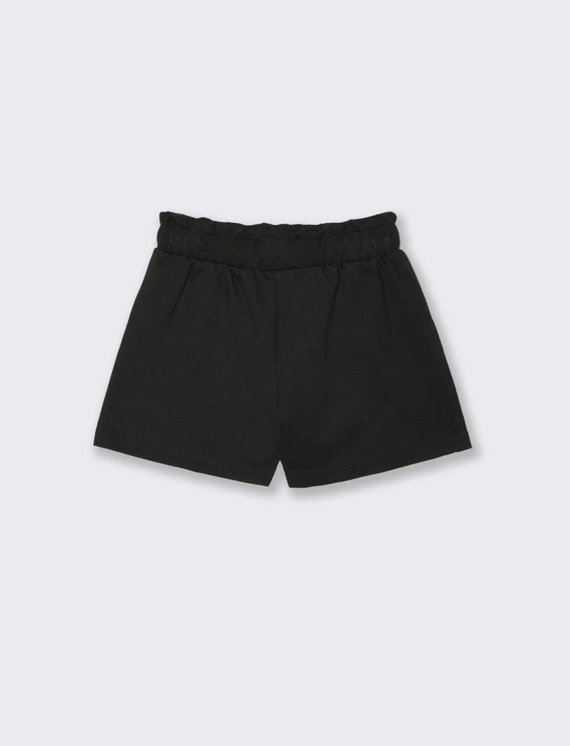 Short elegante in punto milano. - Nero