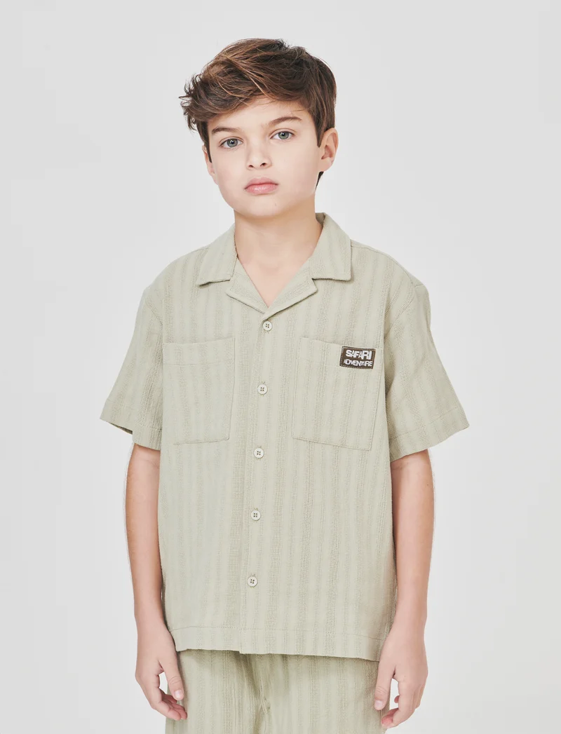Camicia over con colletto e maniche corte - Verde
