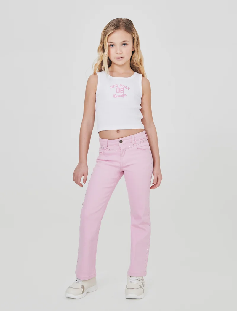 Pantalone flare in denim con borchiette - Rosa