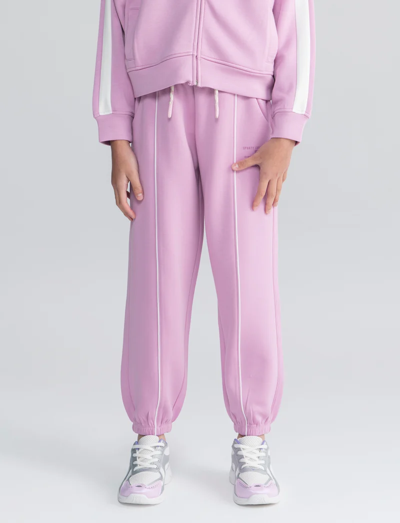 Jogger sportivo con profili a contrasto - Rosa