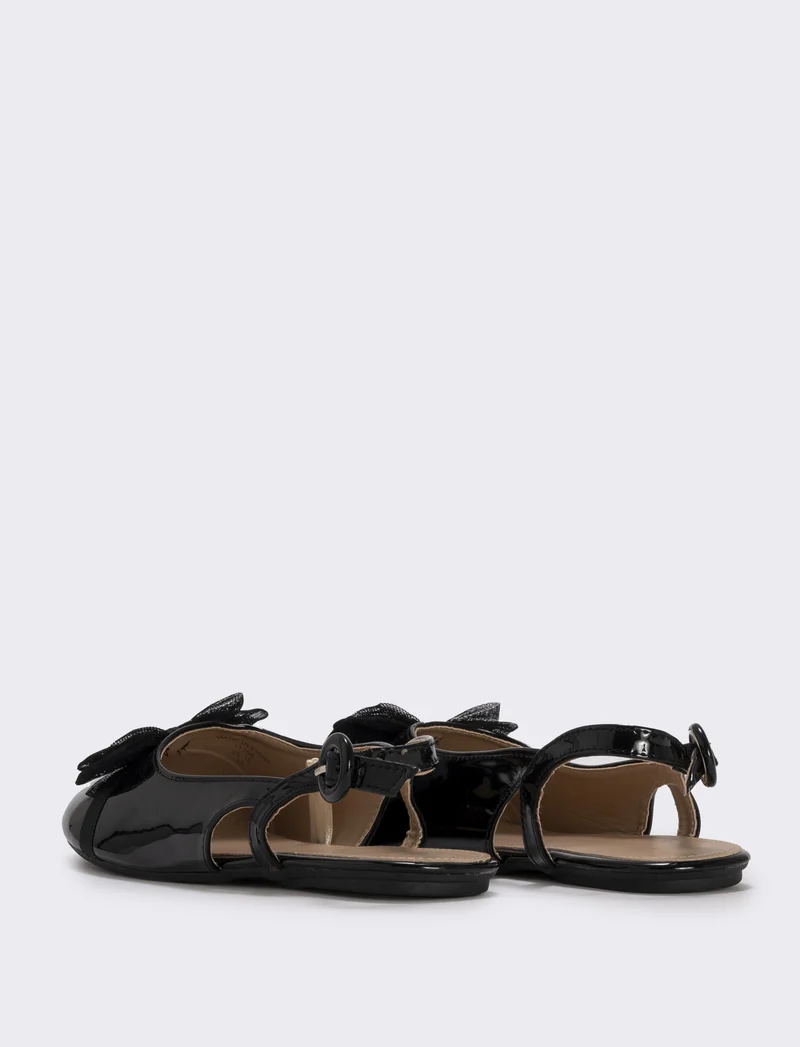Slingback con fiocco in tulle da bambina. - Nero