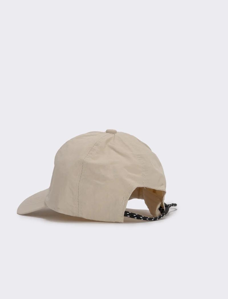 Baseball in tessuto tecnico con cordoncino - Beige