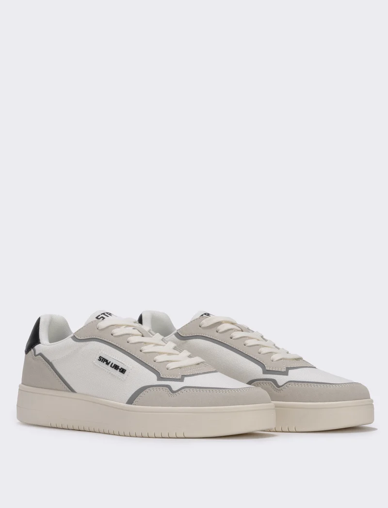 Sneakers uomo in canvas bianco e poliuretano - Bianco