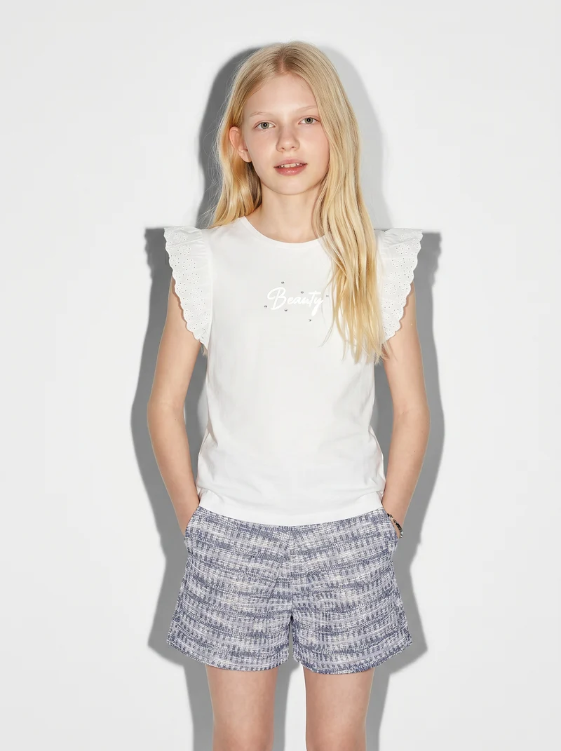 T-shirt estiva bambina con volant e strass - Bianco