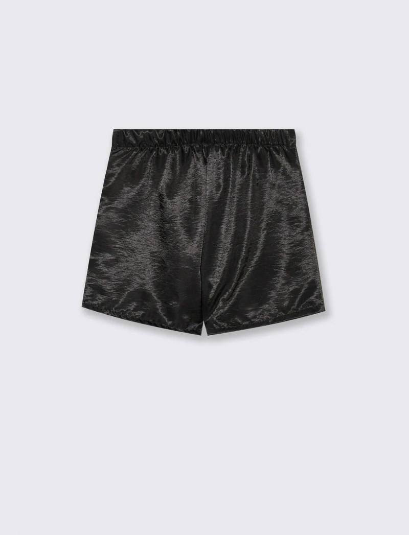 Short elegante in tessuto lucido da bambina. - Nero