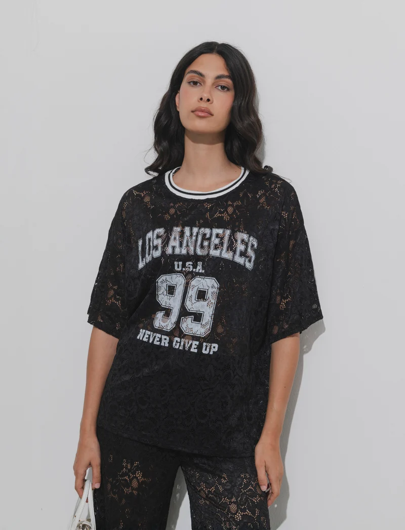 Tshirt in pizzo con stampa sul davanti - Nero