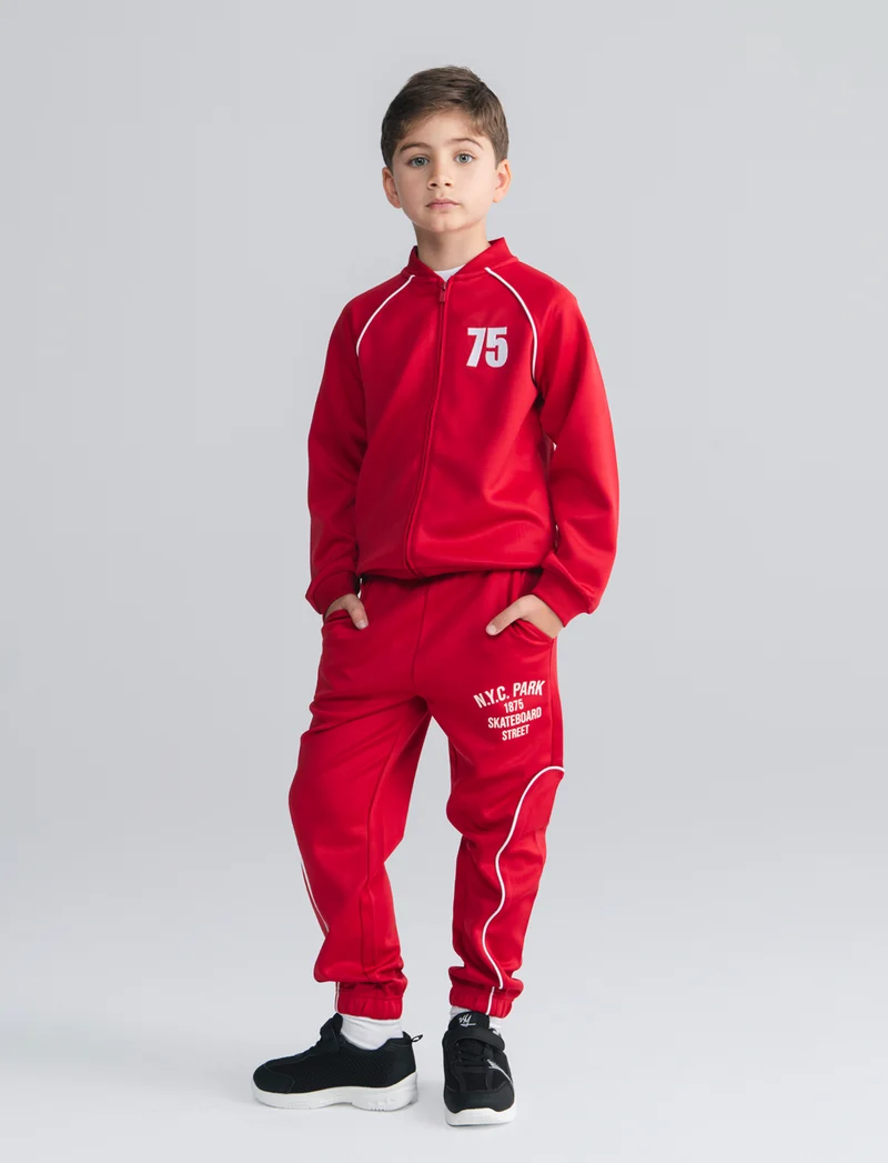 Jogger in felpa leggera con stampa frontale - Rosso india